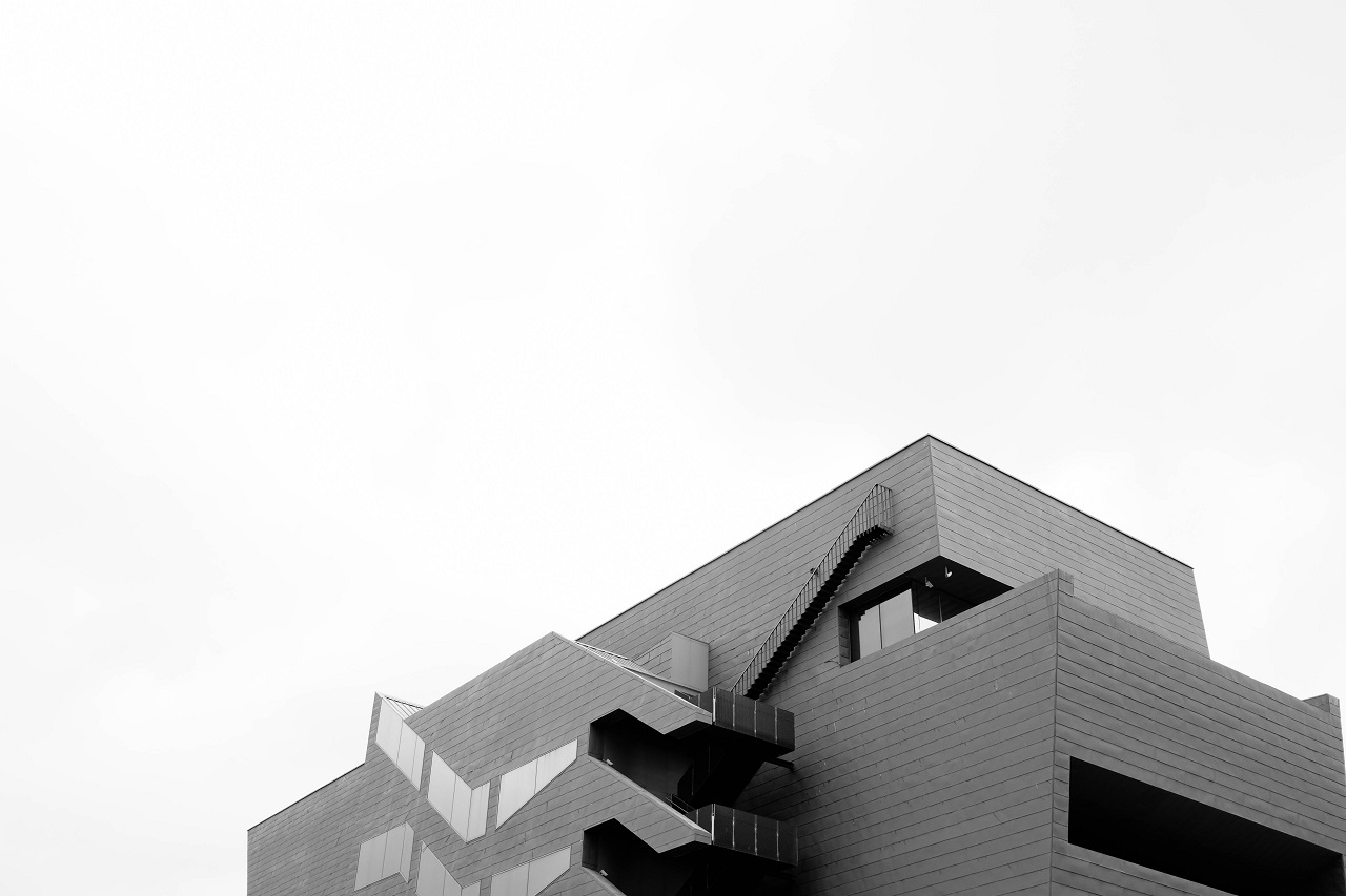 Why Do Commercial Buildings Have Flat Roofs TRI Roofing
